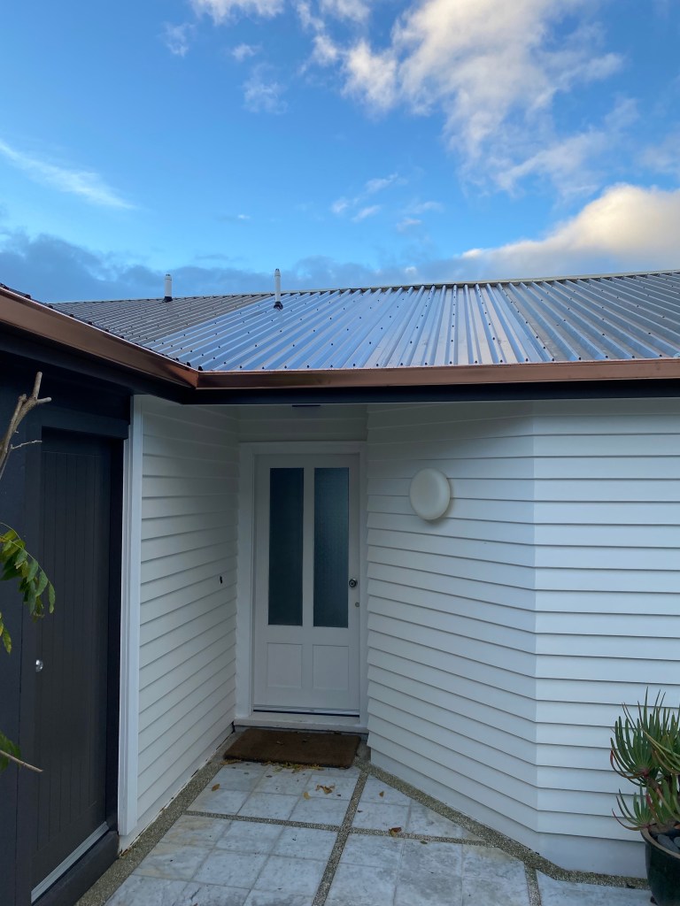 Wellington exterior cladding and roofing Wellington builders character home weatherboard repairs, new roofing and copper guttering installation.